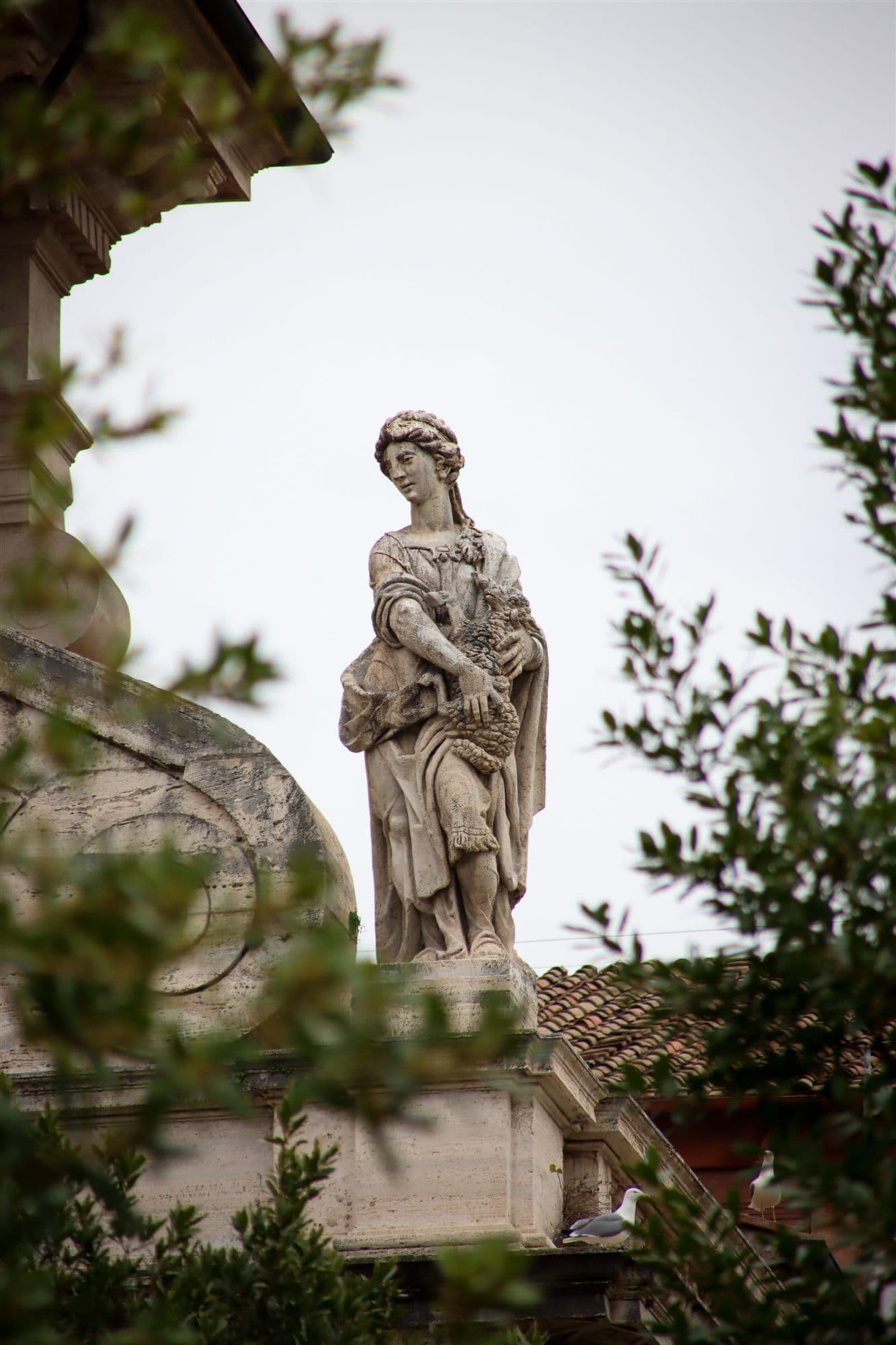 Statue in the Leaves